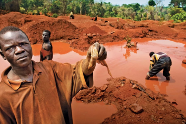 A miner shows a bag containing coltan in the Democratic Republic of the Congo